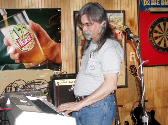 Bal plays his cheesy keyboard