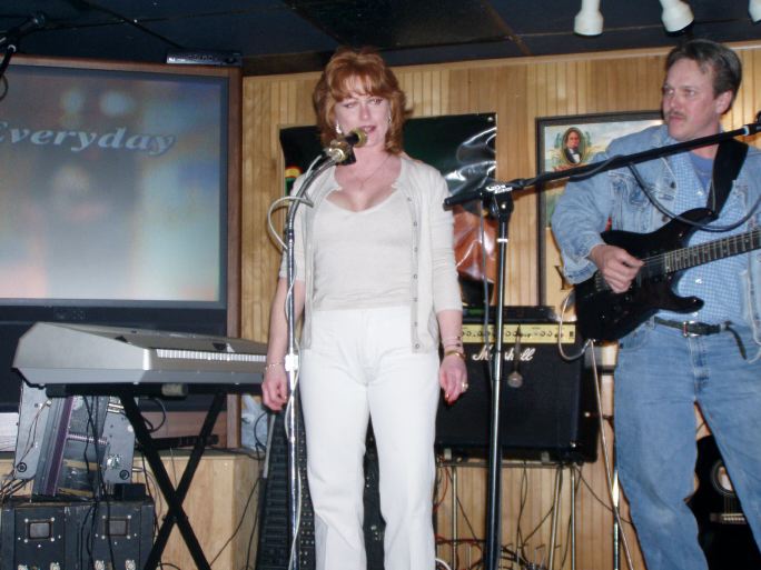 Jackie with a guest guitarist ( she could hold the stage all night )